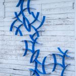 Blue wall hanging sculptures by Morgan Robinson