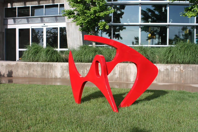 Red metal outdoor sculpture
